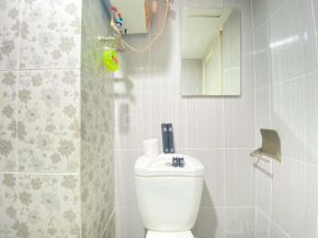Roomy 2BR Apartment at Jarrdin Cihampelas Apartment By Travelio